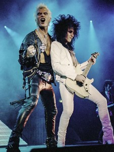 Billy Idol and Steve Stevens on stage in 1987
